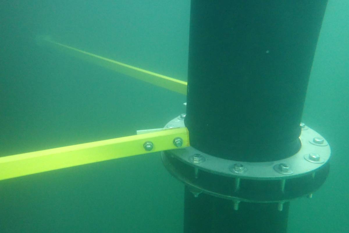 Flanged pipework connection at the base of a reservoir column, checked underwater